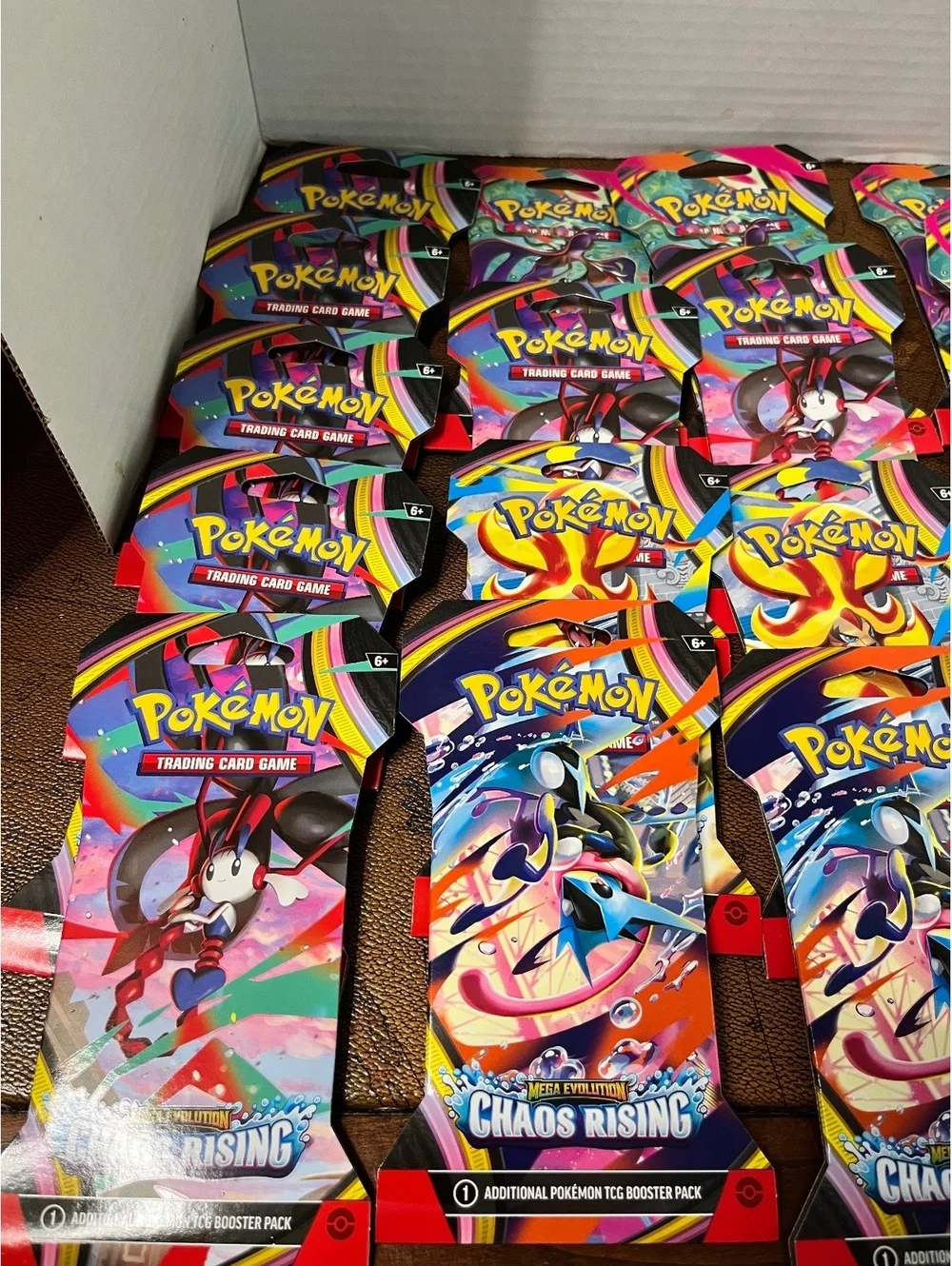 LOT of 24: 2026 Pokémon TCG: Mega Evolution Chaos Rising Booster Packs